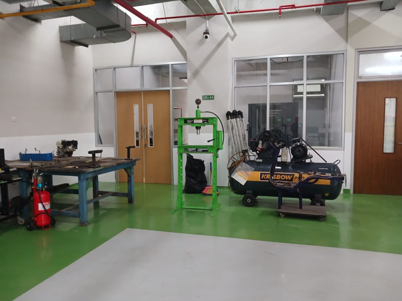 Hydraulic press, air compressor, workbench and fire extinguisher